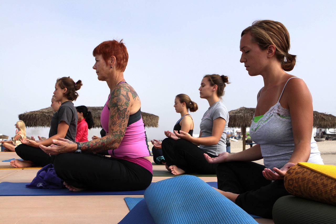 women in yoga class fitness